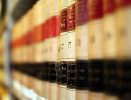 Shelf with auto insurance law books